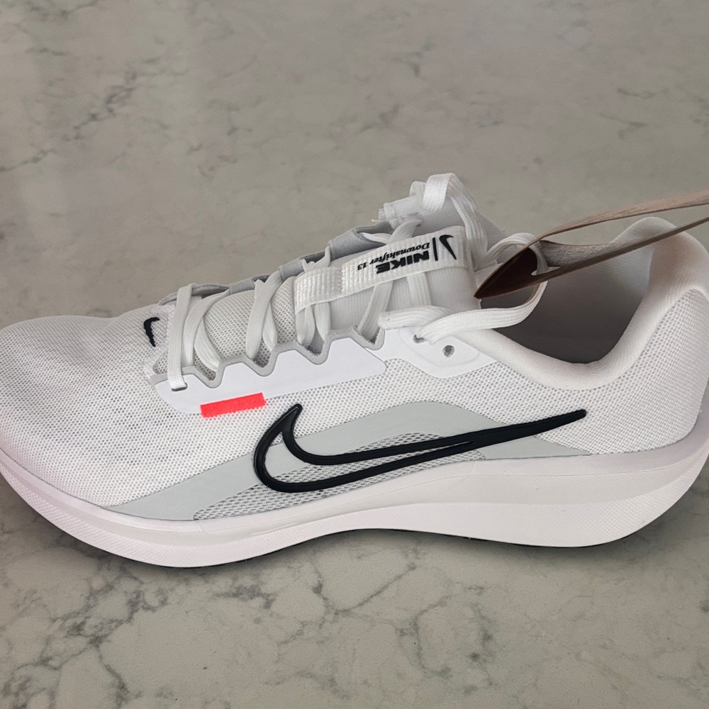 Nike White and Black Sneakers with Red Detail
